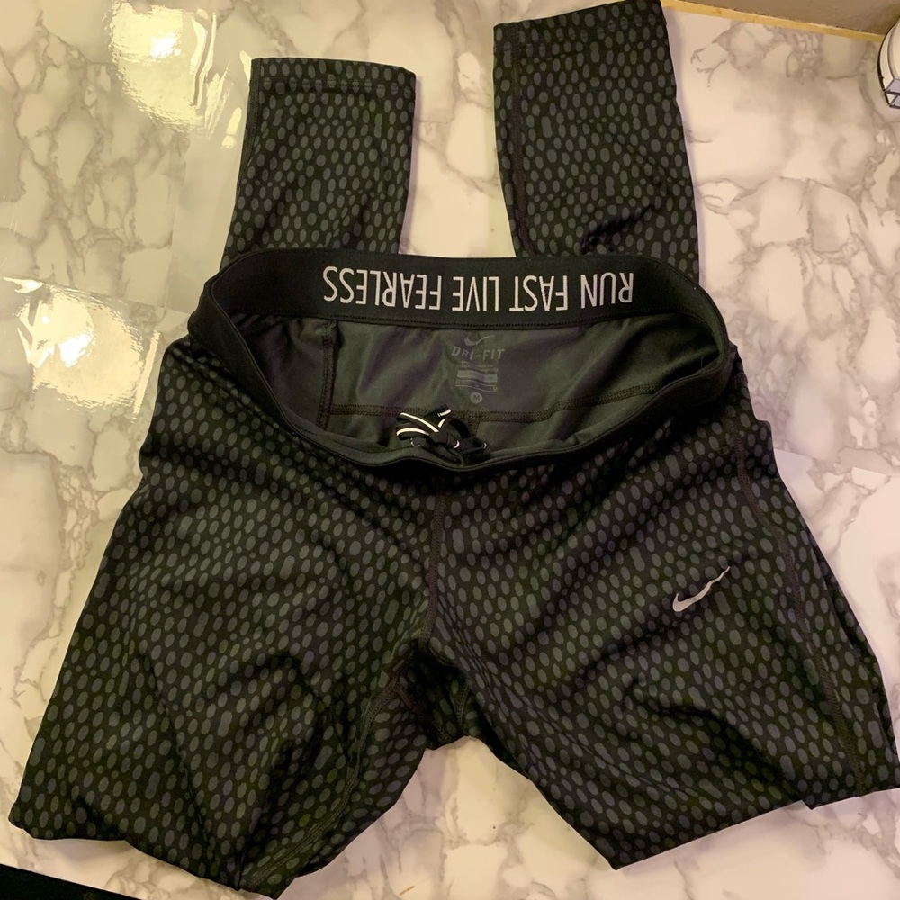 Grey and black patterned Nike full length dry fit